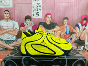 Side profile showing the yellow and black layered design, lace-up closure, and black outsole.