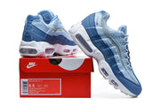 Blue Nike Air Max 95 sneakers displayed with a Nike shoe box and size label.