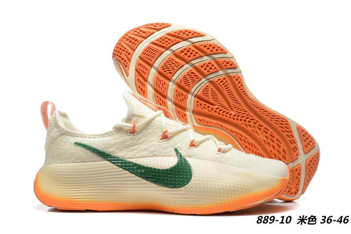 Beige Nike LBJ TR1 sneakers with green side branding and orange outsole accents.