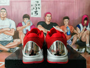 Rear view highlighting the red collars and reflective metallic heel panels.