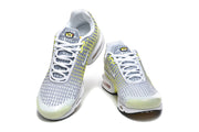 Front views of grey and volt yellow-green Nike Air Max Plus VII sneakers.