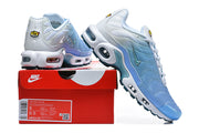 Nike Air Max Plus sneakers displayed with a box label showing style code DM0032-026 and a sample size.