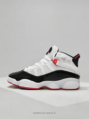 Side profile of the white, black, and red high-top sneaker with layered panels and Jordan side detailing.