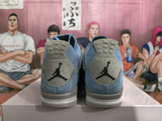 Rear view showing speckled gray heel panels with black Jumpman branding.