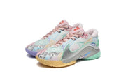 Multicolor Nike LeBron 22 sneakers with pastel panels, pink laces, gray sections, and gum-colored outsoles.