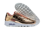 Nike Air Max 90 QS sneakers shown from the side with the outsole visible.
