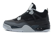 Side profile of a black and grey Jordan 4-style high-top sneaker with white accents and a speckled midsole.