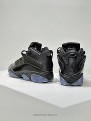 Rear view showing padded collars, molded heel supports, black panels, and translucent blue outsole sections.