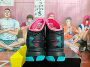 Rear view showing the black textured uppers, pink collars and blue heel outsole sections.