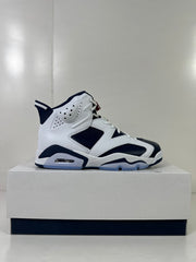 Opposite side profile of the high-top sneaker with perforated collar panels and translucent outsole sections.