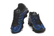 Front views of black and blue Nike Shox sneakers
