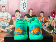 Rear view showing turquoise heel panels with blue and orange graphics.