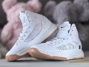 Pair of white high-top shoes with black logo accents and gum-colored outsoles