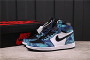 Pair of blue tie-dye high-top sneakers displayed in front of a Nike-branded shoebox.