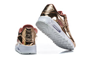 Nike Air Max 90 QS sneakers shown from the heel and outsole.
