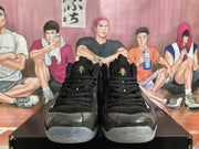 Front view of the pair showing black laces, Nike swooshes, tongue emblems and reflective toe panels.