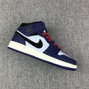 Angled outer-side view highlighting the mid-top construction and contrasting panels.