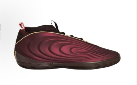 Side view of burgundy low-top sneakers with a sculpted ripple-effect upper, dark sole, and rear pull tab.