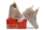 Light beige Nike Air Max 90 Winter sneakerboots displayed with a shoebox; the box label shows size 8, UK 7, EU 41, and CM 26.