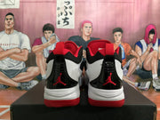 Rear view of white, black, and red Jordan Flight basketball sneakers