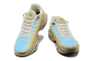 Pair of multicolor Nike Air Max Plus sneakers viewed from the front