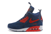 Side profile of a navy and red Nike Air Max 90 SneakerBoot
