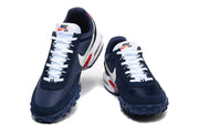 Front view of the navy Nike Air Max Waffle SP sneakers, showing white laces and tongue branding.