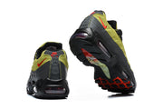 Rear and outsole views of green and anthracite Nike Air Max 95 TT sneakers
