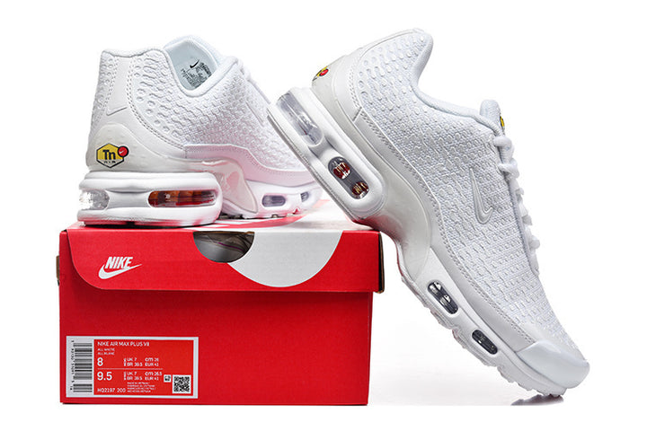 White Nike Air Max Plus VI sneakers with a red Nike shoe box; the box label shows a sample size.