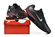Pair of black Nike Air Max 720 sneakers displayed with a red Nike shoe box.