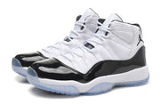 Close product view of the pair of white and black high-top sneakers.