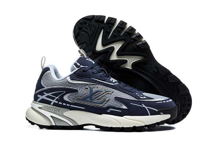 Navy and grey Louis Vuitton-branded sneakers, side view with outsole visible