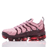 Side profile of a pink and plum Nike TN-18 sneaker.