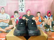 Front view of black Nike basketball shoes with lace-up closures