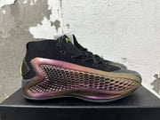 Side profile of a black high-top shoe with a dark red and bronze textured panel and gray sole.