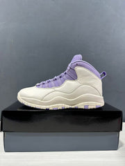 Side profile of a white and purple high-top sneaker with stitched overlays and a segmented outsole.