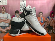 Angled view of the white and black Nike KD Trey 5 X shoes, with size 35 marked on the sample.