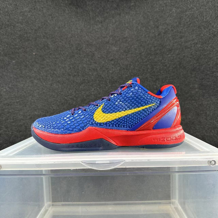 Side view of a blue Nike basketball shoe with a yellow Swoosh, red accents, and a low-cut profile.