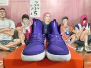 Front view of purple Nike Hyperdunk basketball shoes with white soles