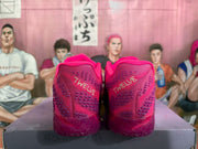 Rear view of bright pink Nike basketball sneakers showing textured heels, patterned uppers, and translucent outsoles.
