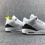 Rear-side close-up of the pair showing the brown heel overlays and visible air units.