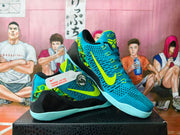 Turquoise Nike Kobe basketball shoes shown from side and top angles