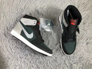Top-down view of the pair showing the high-top construction, dark green toe panels, grey overlays and white midsoles.