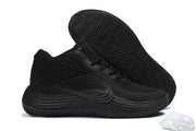 Single all-black Nike Precision 8 shoe displayed beside its outsole.
