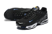 Angled top and side views of black Nike Air Max Plus TN sneakers.