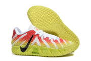 Side view of a sneaker showing the black Swoosh, yellow translucent outsole, and ZoomX text.