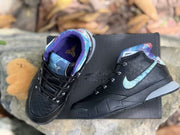 Top and side view of the shoes showing the laces, collars, and blue accents.