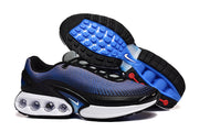 Black and blue Nike sneakers shown from the side and outsole