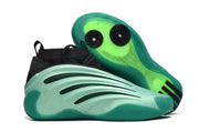 Green and black Adidas Harden Vol. 9 sneaker showing the side profile and outsole traction.