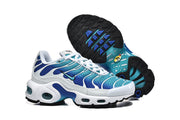 Nike Air Max Plus sneakers shown from the side and underneath, highlighting the patterned outsole.
